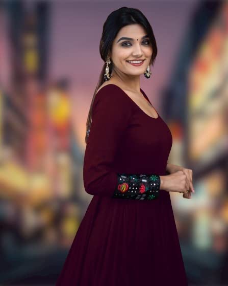 Maroon long-sleeve gown with square neckline and patterned waistband trim