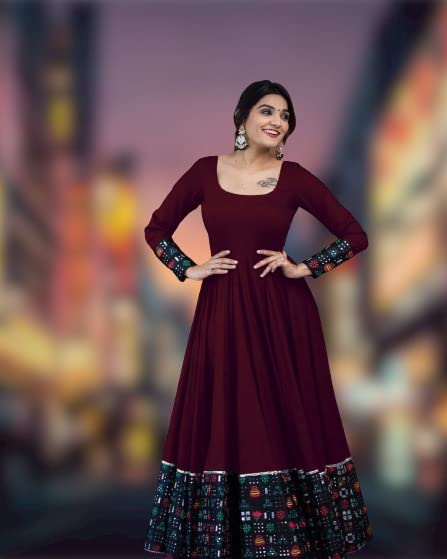 Maroon long-sleeve maxi gown with patterned cuffs and full gathered skirt hem