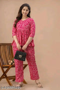 Pink printed co-ord set with 3/4 sleeve peplum top and wide-leg pants