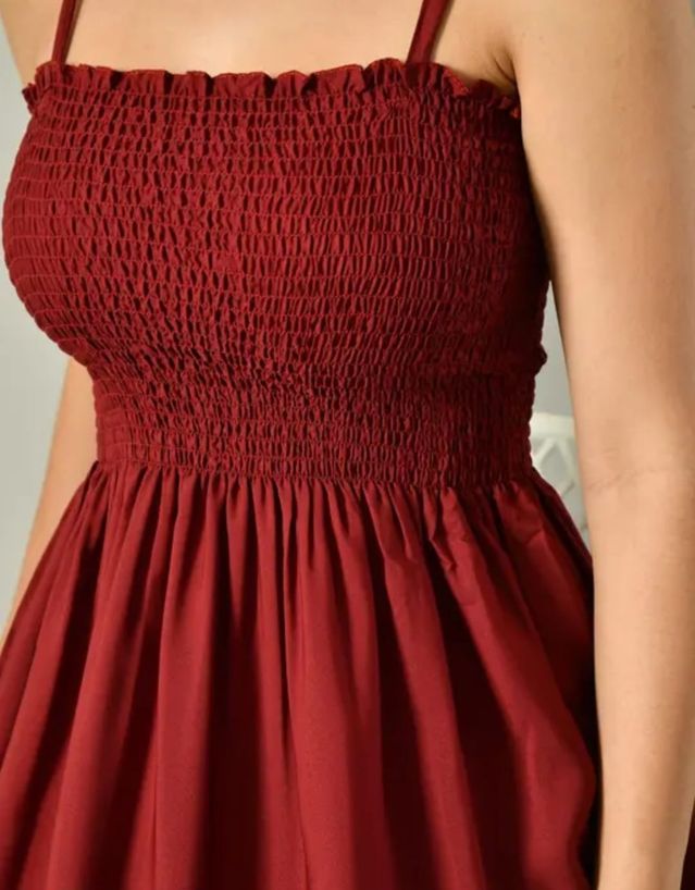 Maroon smocked bodice with gathered skirt and spaghetti straps
