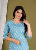 Aqua-blue floral print top and matching pants set, 3/4 sleeves, round neckline