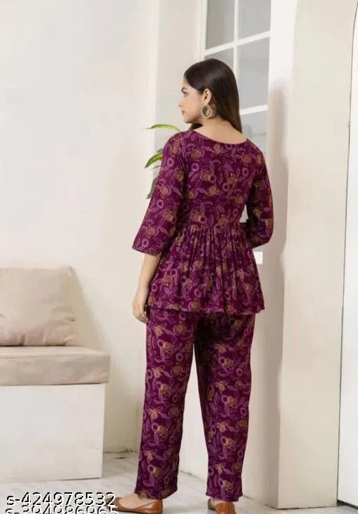 Women's printed co-ord set, purple patterned tunic top and straight pants (back)