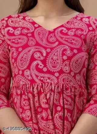 Pink paisley print peplum top with V-neck and 3/4 sleeves