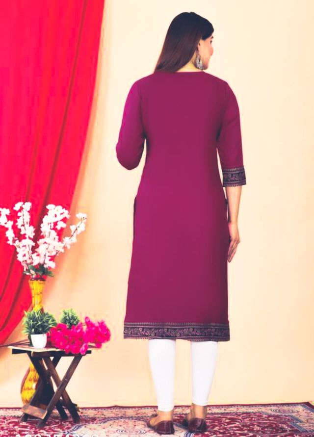 Women's maroon kurti with dark embroidered sleeve cuffs and straight hem