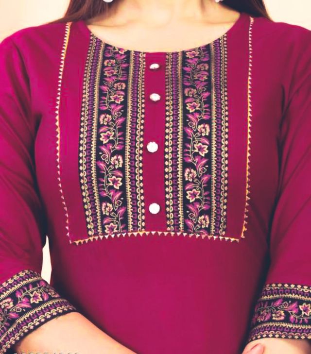 Women's maroon kurti neckline with floral embroidery and dotted button placket