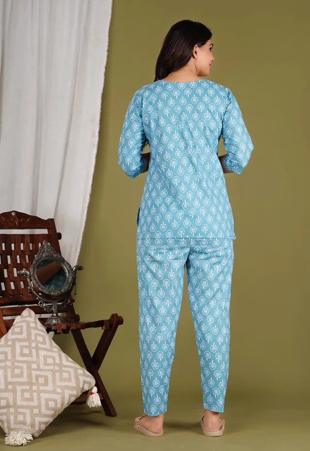 Aqua-blue floral print co-ord set, back view: 3/4 sleeve top with matching pants