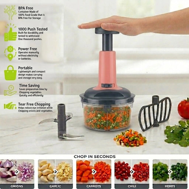 Manual vegetable chopper with pink push handle, clear bowl, and stainless blade