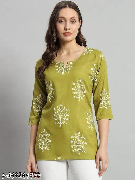 Green short kurti, three-quarter sleeves, round neckline, white floral tree print