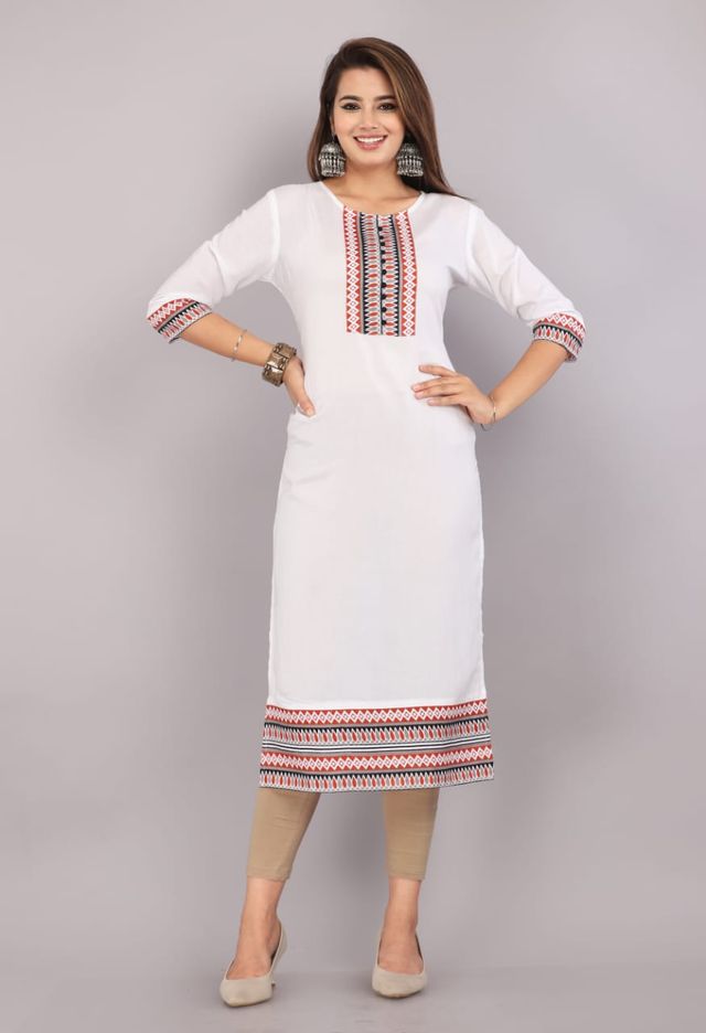Women's white kurti with vertical yoke embroidery, three-quarter sleeves, and hem border